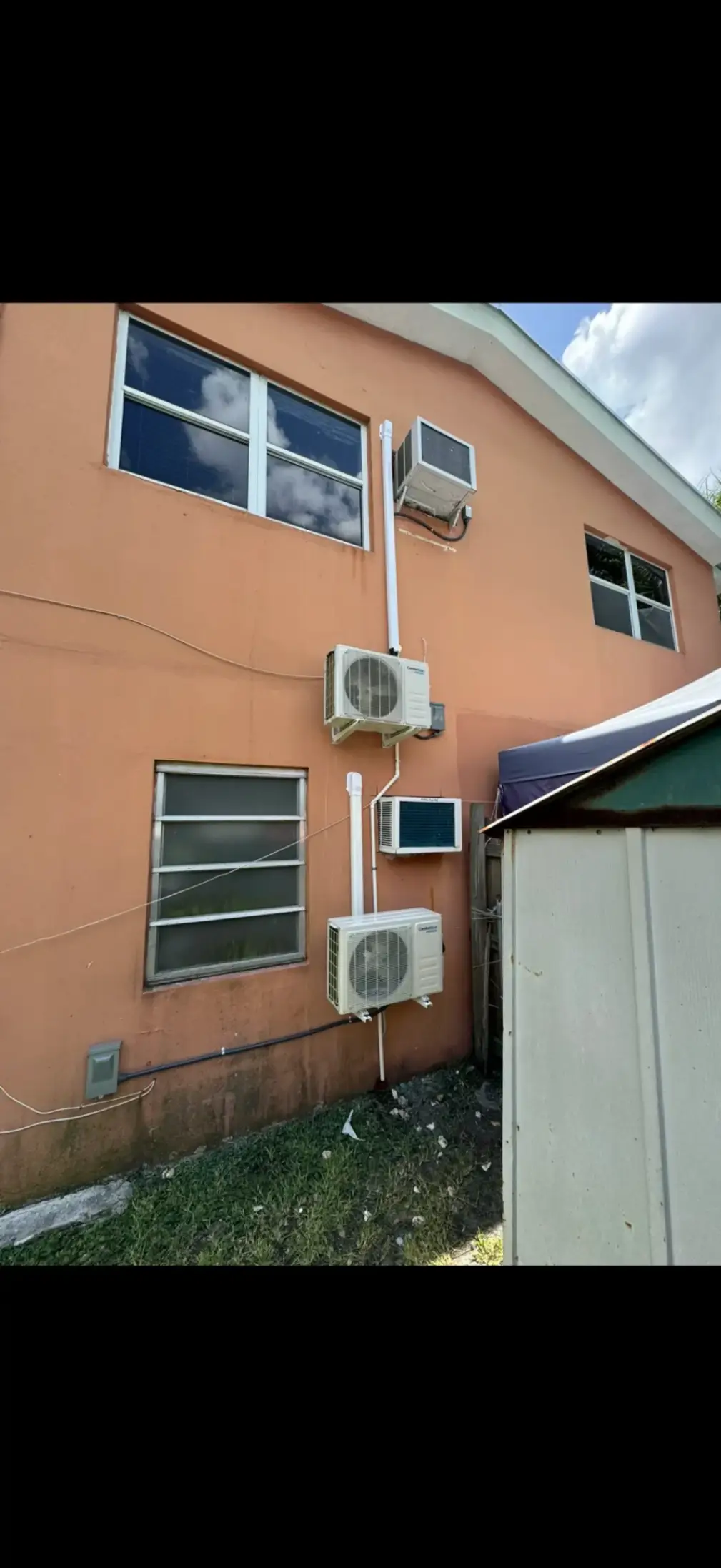 Mini split AC units installed on exterior wall